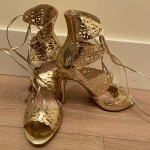 Gold strappy heels with ties & laser cutouts